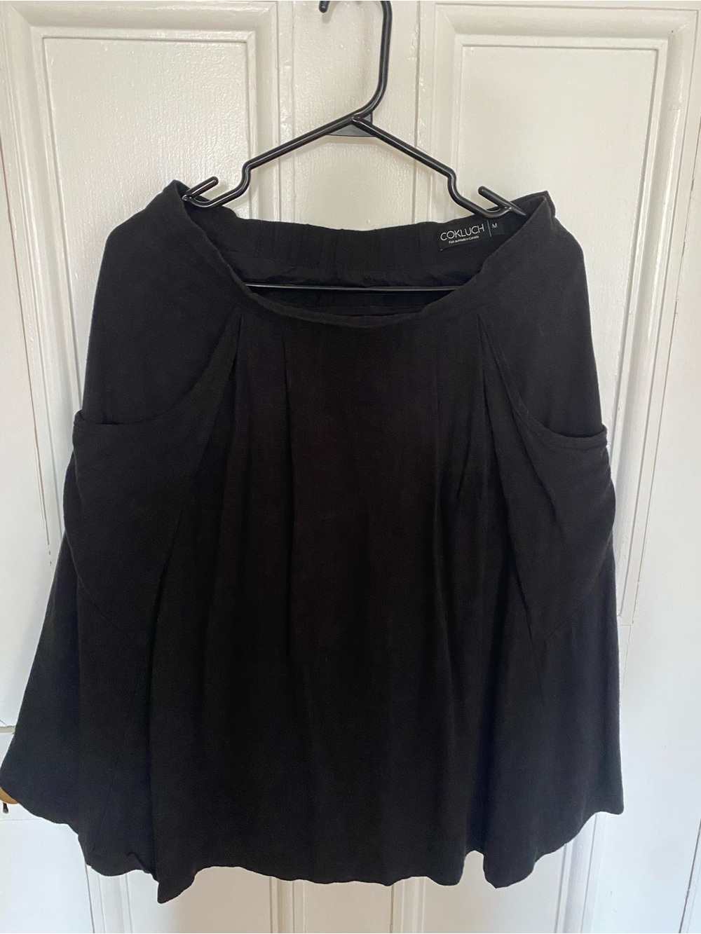 Cokluch Black A-Line Pleated Pocket Skirt